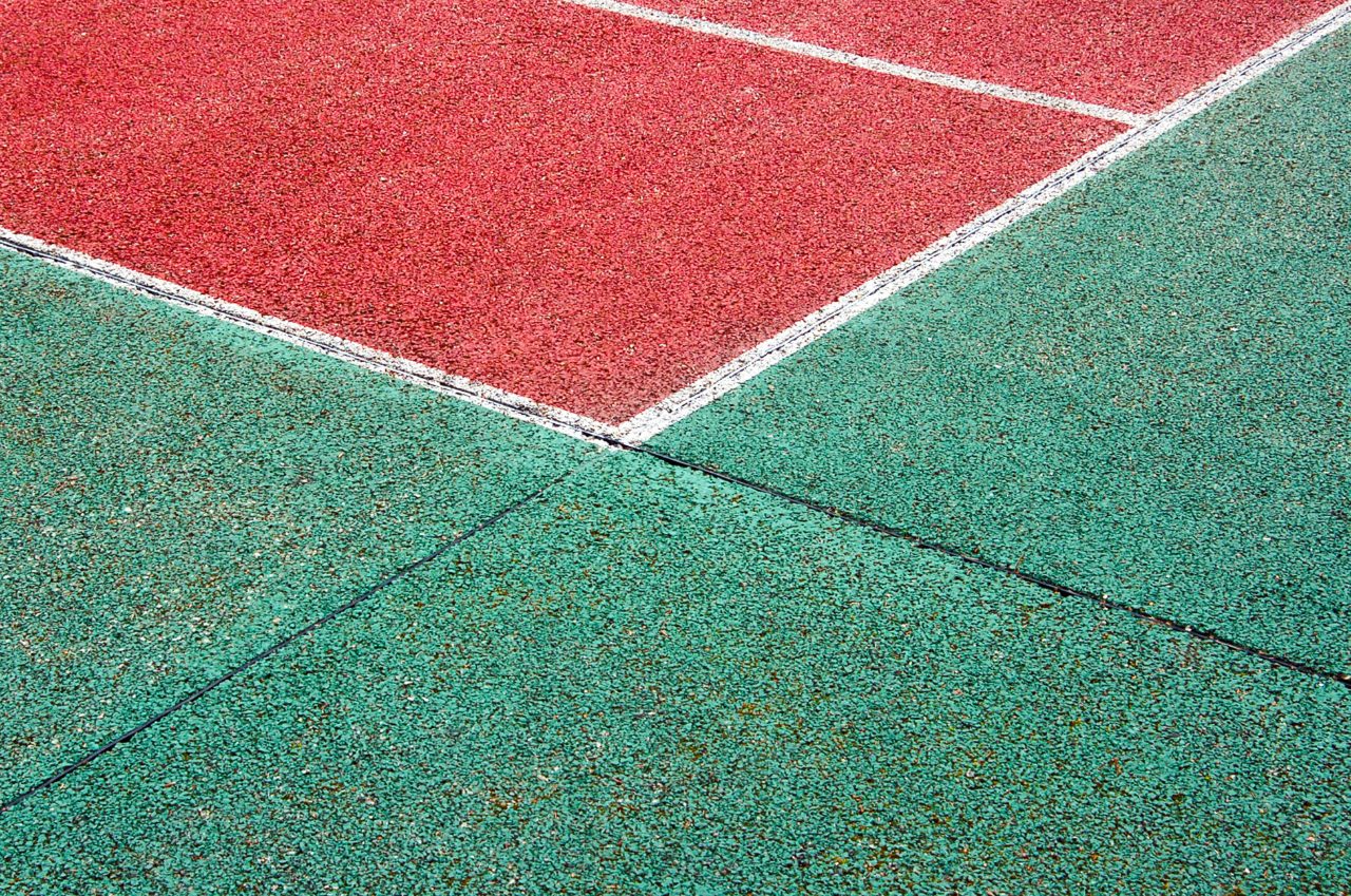 Sport court surface with marked lines